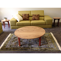 1100 mm diameter retro style coffee table and matching wine tables.Tops are feature grade Blackbutt. Bases are Jarrah.